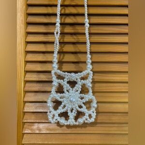 Micro, pearl crossbody bag by Akira